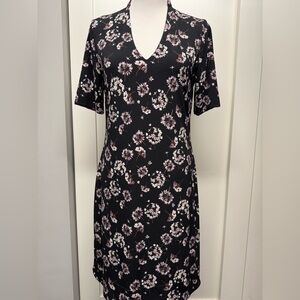 WHBM - Reversible with print on one side and solid color on the other. Size L